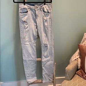 Distressed light wash jeans